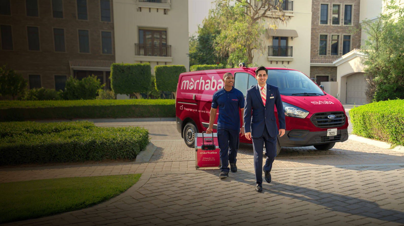 marhaba Check-in Anywhere representative in front of a Dubz van