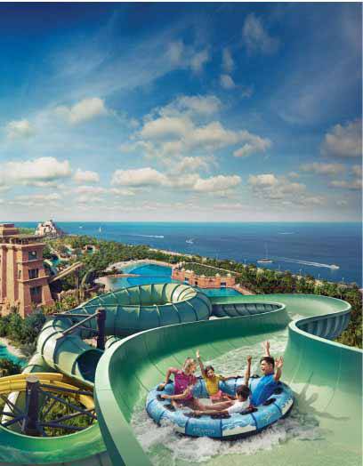 A family enjoying a slide at Atlantis Aquaventure