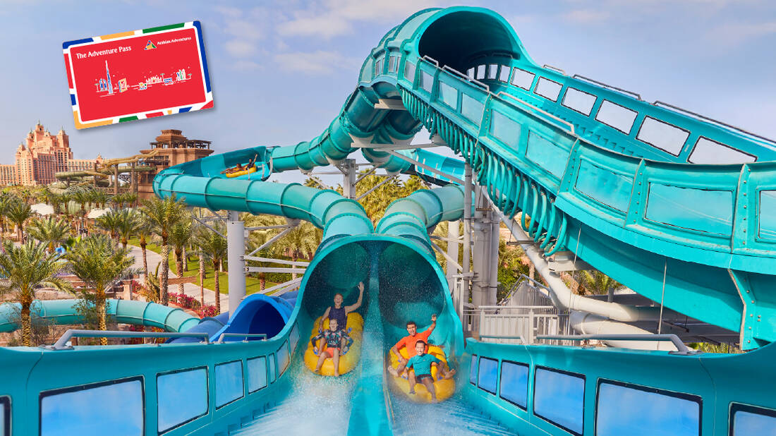 A family enjoying a slide at Atlantis Aquaventure
