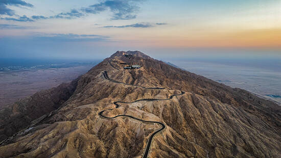 The summit of Jebel Hafeet and the winding road that leads to it