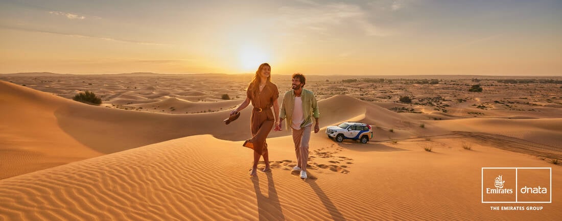 Happy couple on desert safari