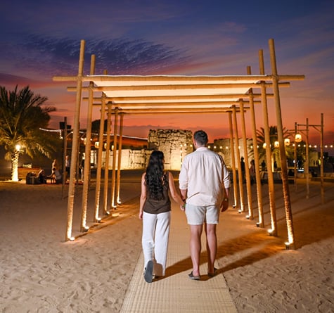 Couple Entering Fort Liaisili at night