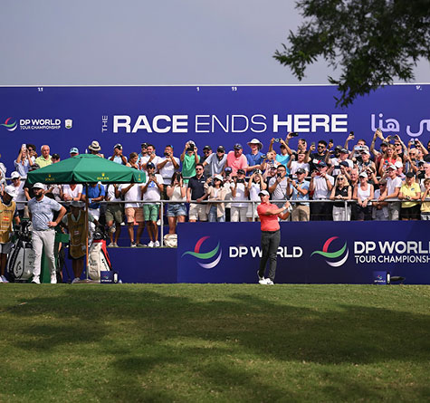 Fans watching the DP World Championship on the golf course on the golf course