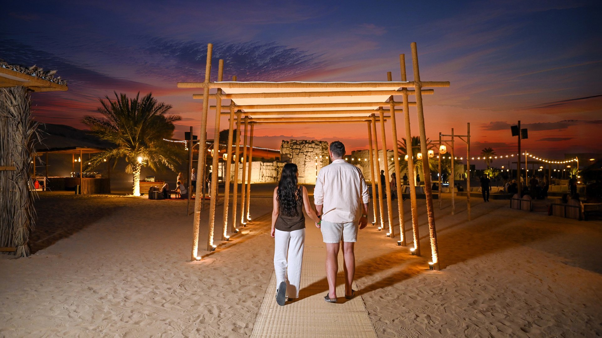 Couple Entering Fort Liaisili at night