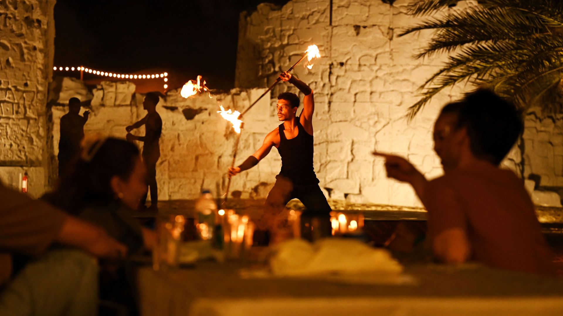 Fire show performer performing at Fort Liaisili 